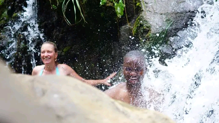 Mahoma Waterfalls cascading through Rwenzori rainforest
